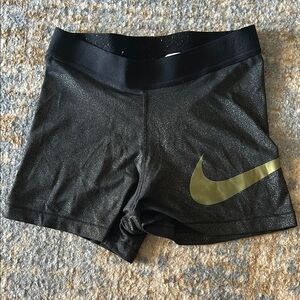 Nike Women's Black and Gold Shorts